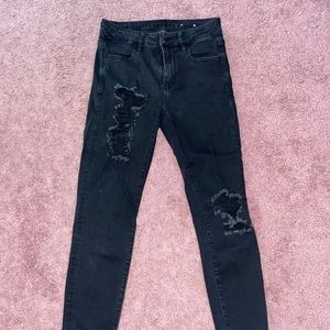 High-rise stretch ripped skinny jeans